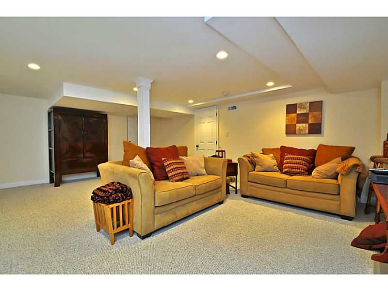 19 Terrace Avenue Riverside, CT 06878 - Photo 20 of 25 a living room with furniture a ceiling fan and a rug
