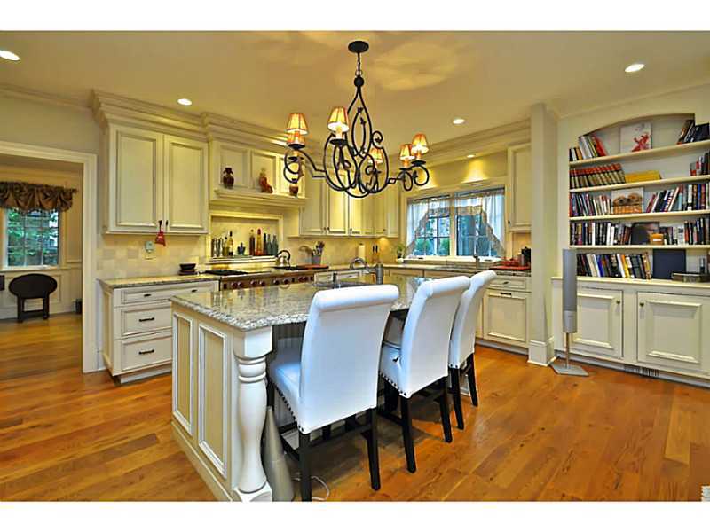 19 Terrace Avenue Riverside, CT 06878 - Photo 10 of 25 a dining room with stainless steel appliances kitchen island granite countertop a table and chairs
