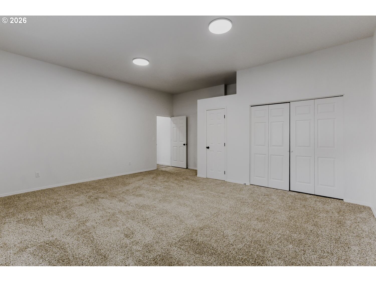 7642 Southwest 205th Terrace Beaverton, OR 97007 - Photo 11 of 28 a view of an empty room