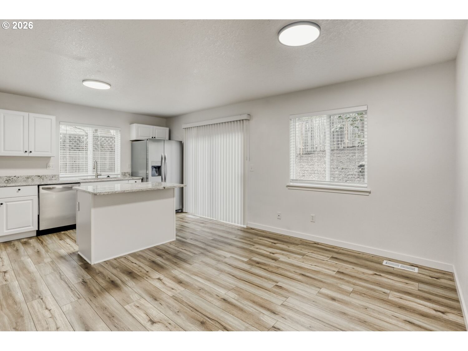 7642 Southwest 205th Terrace Beaverton, OR 97007 - Photo 15 of 28 a view of kitchen with wooden floor
