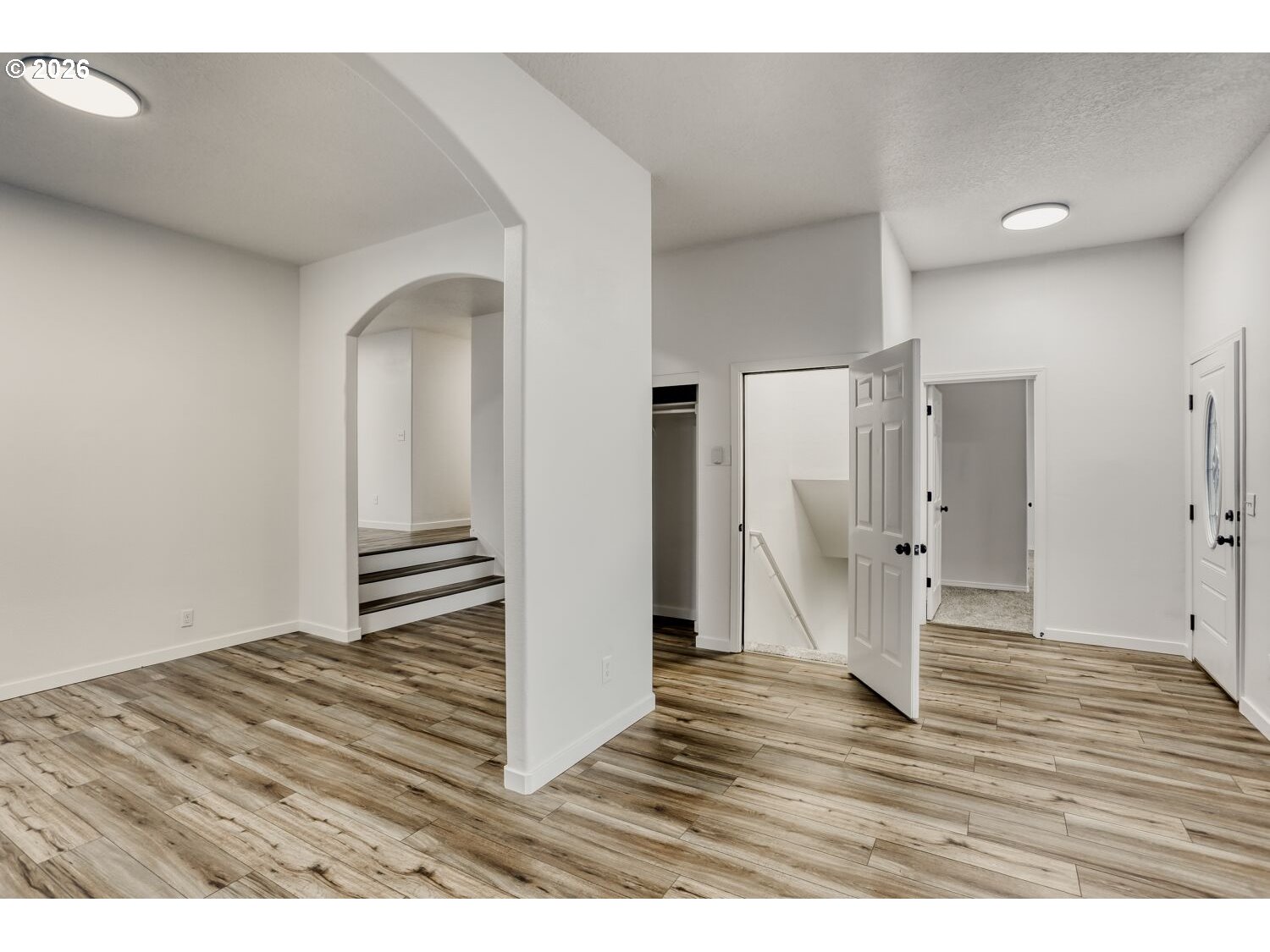 7642 Southwest 205th Terrace Beaverton, OR 97007 - Photo 6 of 28 a view of empty room with wooden floor