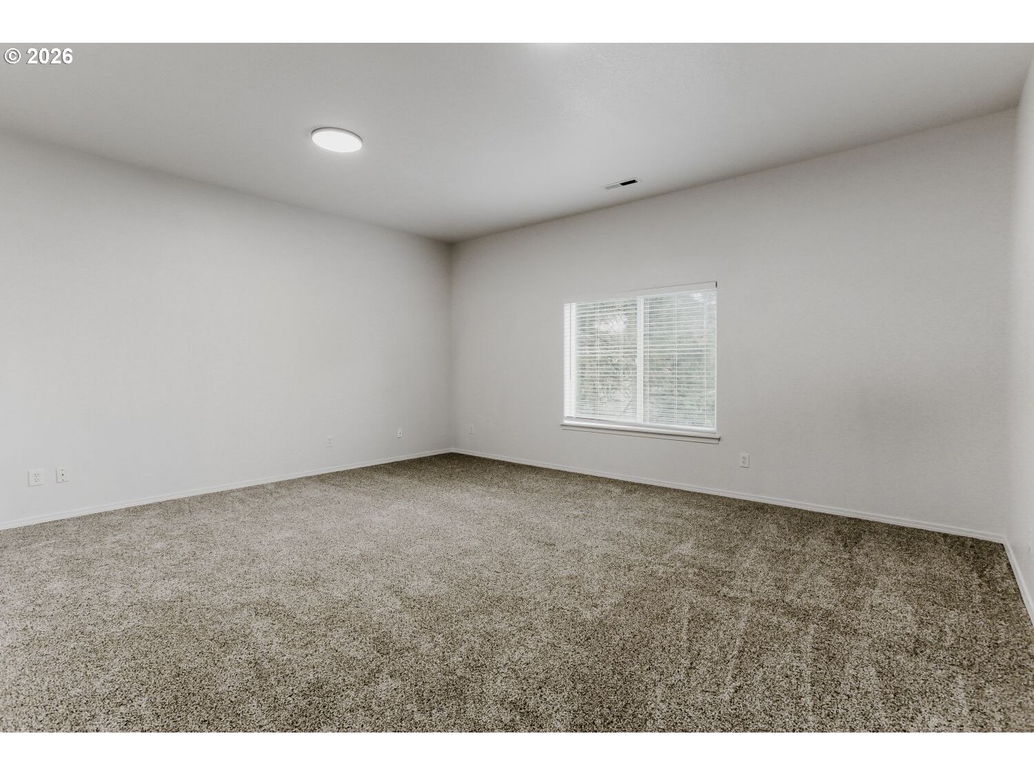 7642 Southwest 205th Terrace Beaverton, OR 97007 - Photo 10 of 28 a view of a big room with windows