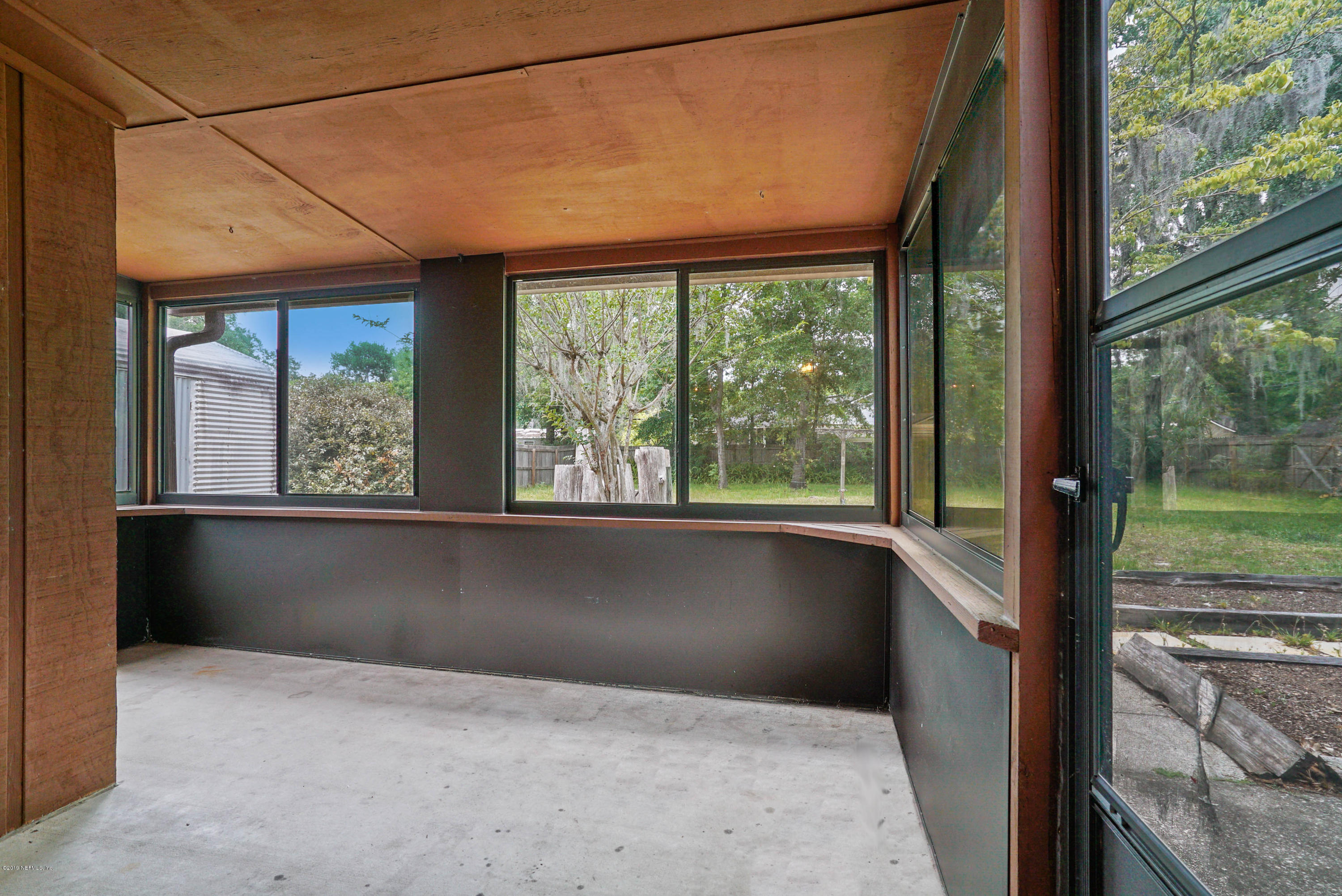 5353 Hickson Road Jacksonville, FL 32207 - Photo 17 of 18 a view of a room with a large window