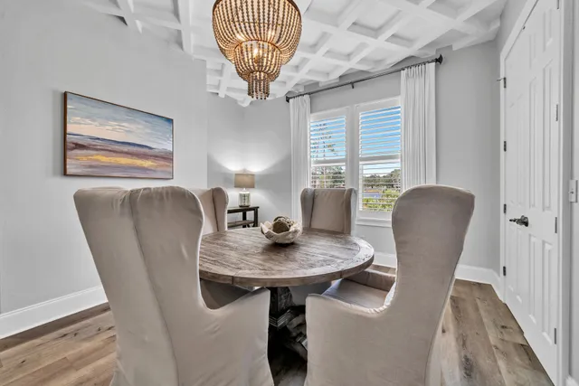 a view of a street with a large tree