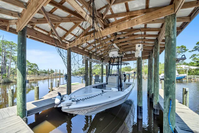 a view of balcony with outdoor seating and wooden floor