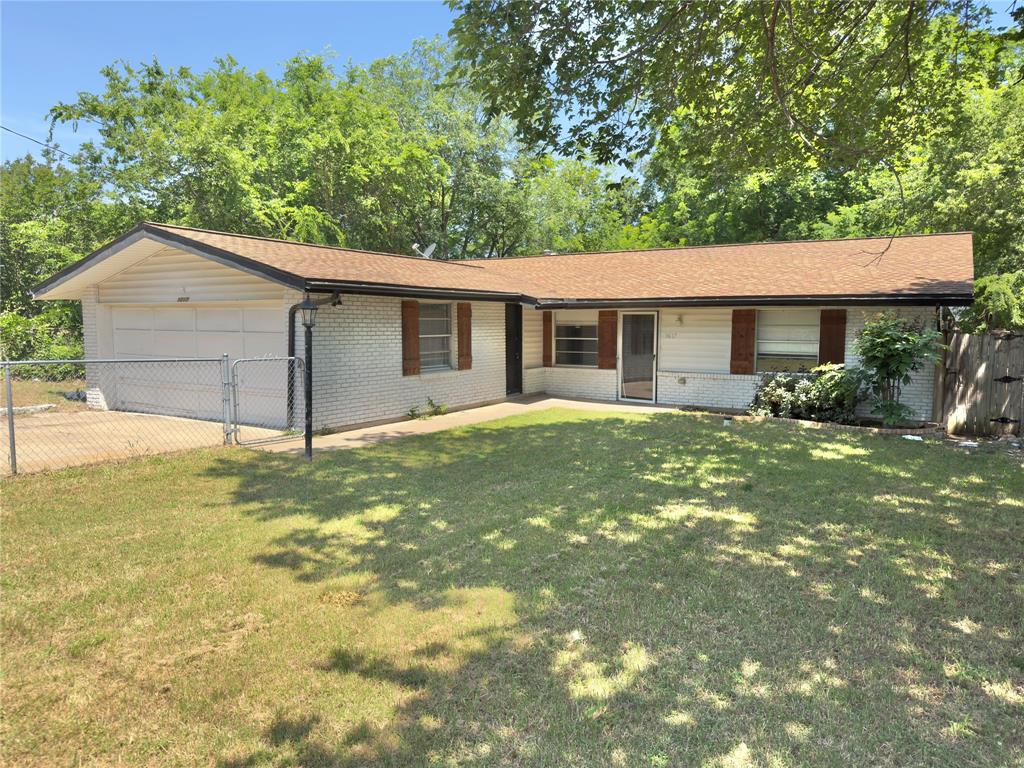1617 East Union Bower Road Irving, TX 75061 - Photo 1 of 14 a house view with a garden space