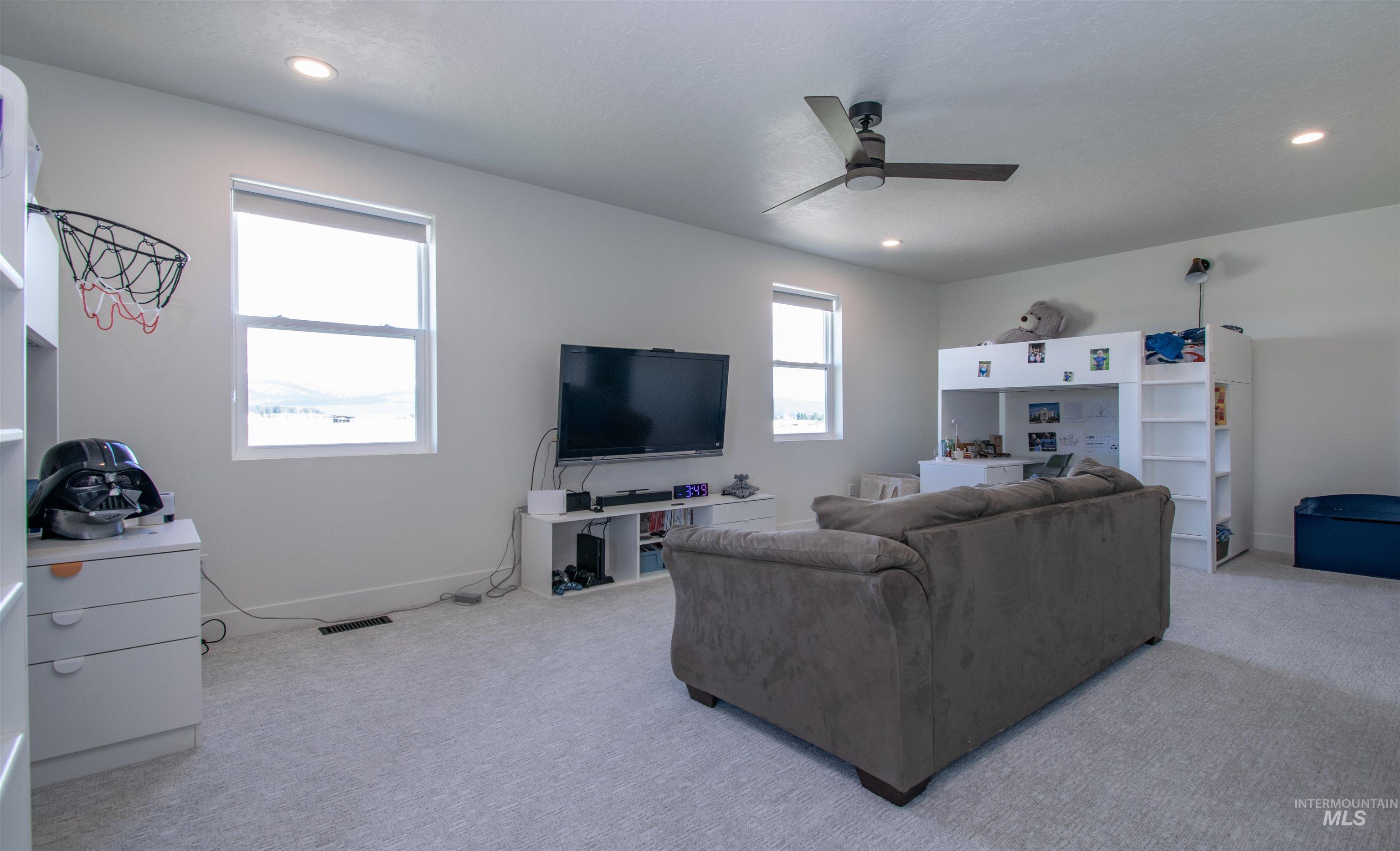 44 Big Moose Road McCall, ID 83638 - Photo 34 of 50 Spacious room featuring light-colored carpeting and bright white walls