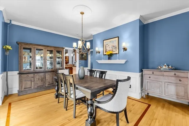 a view of a dining room with furniture and window