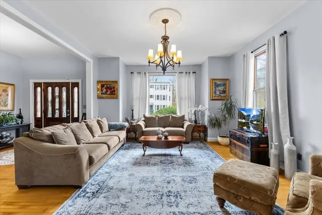 a living room with furniture or couch and a window