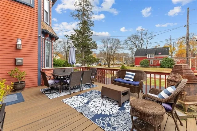 a view of a chairs and table in the balcony