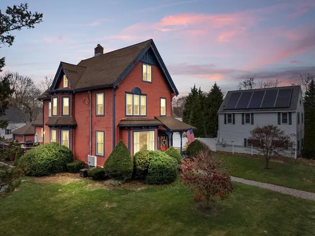 front view of a house with a yard