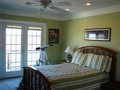 Undisclosed Address Dennis, MA 02638 - Photo 17 of 29 a bedroom with furniture and a window