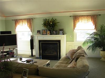 Undisclosed Address Dennis, MA 02638 - Photo 6 of 29 a living room with furniture and a fireplace