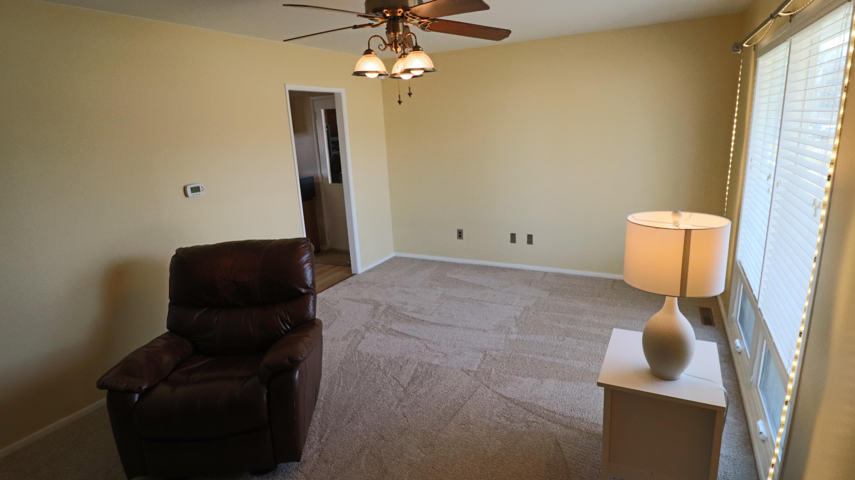 3867 South Liverpool Road Hobart, IN 46342 - Photo 6 of 27 a living room with furniture and a window