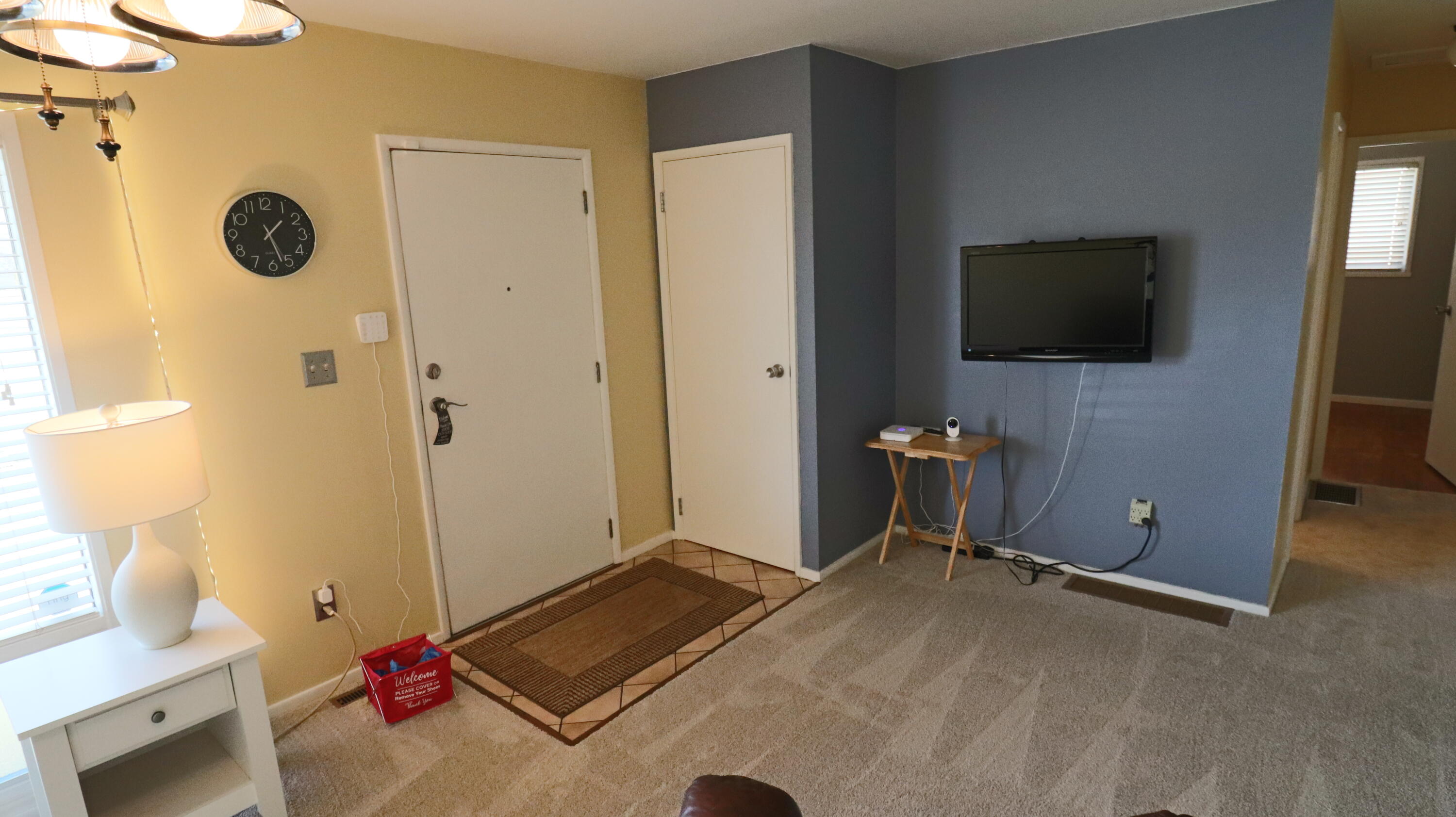 3867 South Liverpool Road Hobart, IN 46342 - Photo 7 of 27 a view of a livingroom with furniture and a flat screen tv