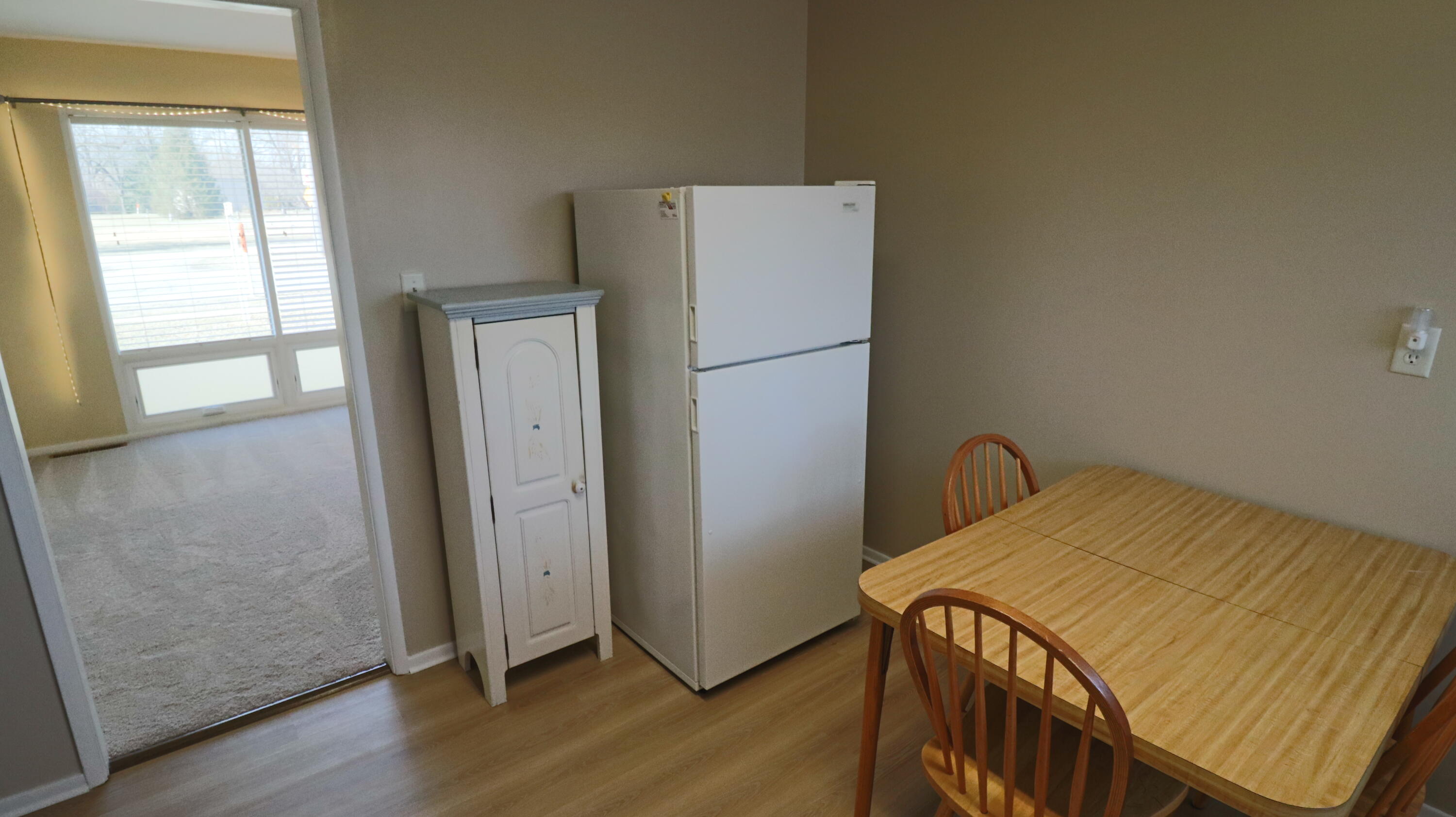 3867 South Liverpool Road Hobart, IN 46342 - Photo 9 of 27 a bedroom with a bed and wooden floor
