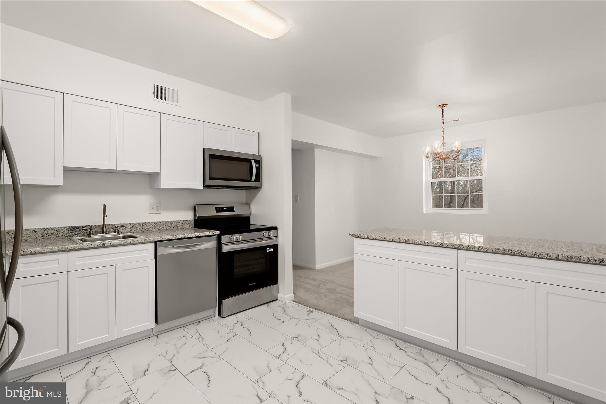 102 Castletown Road, Unit 201 Lutherville-Timonium, MD 21093 - Photo 11 of 33 Updated kitchen