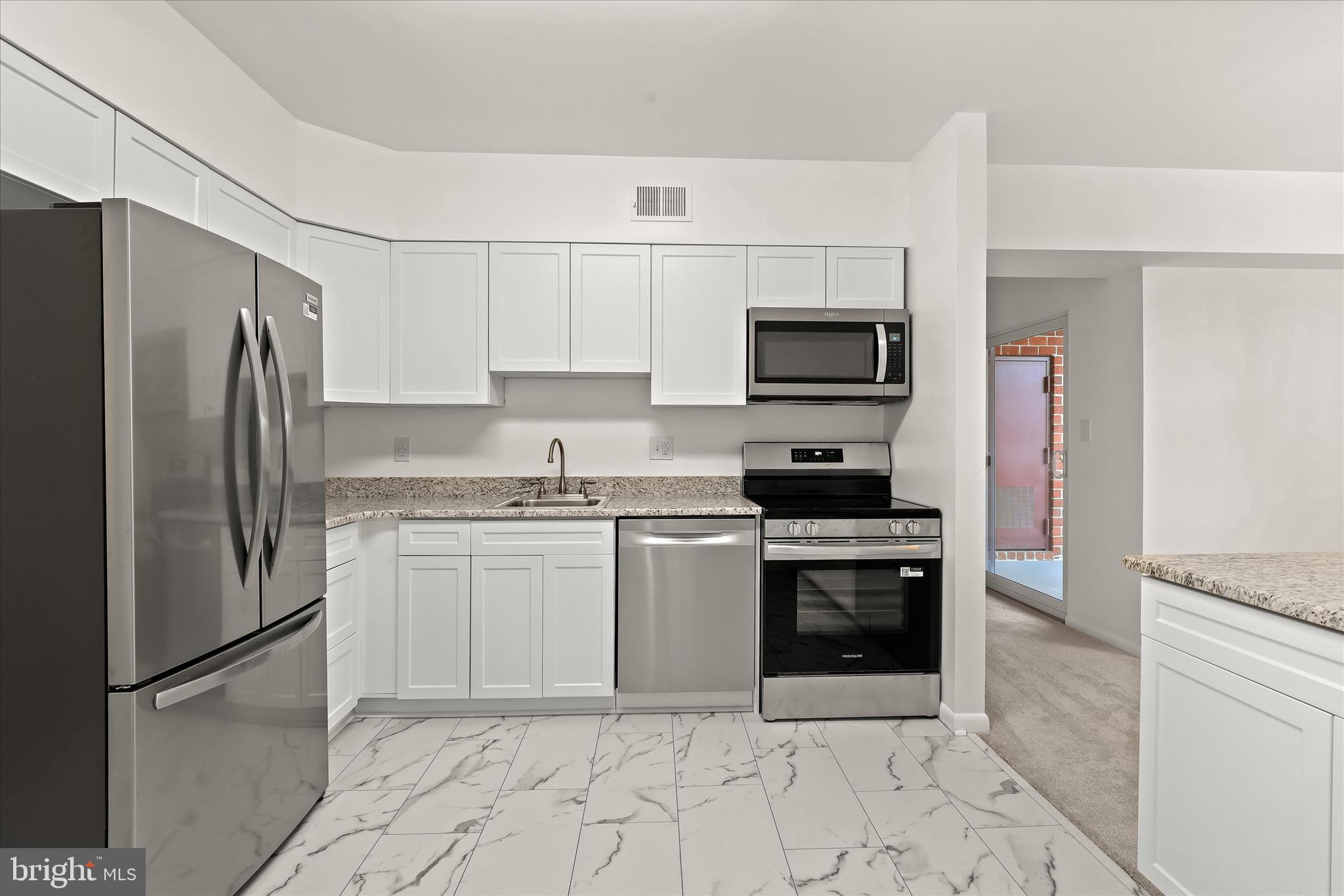 102 Castletown Road, Unit 201 Lutherville-Timonium, MD 21093 - Photo 2 of 33 Updated kitchen