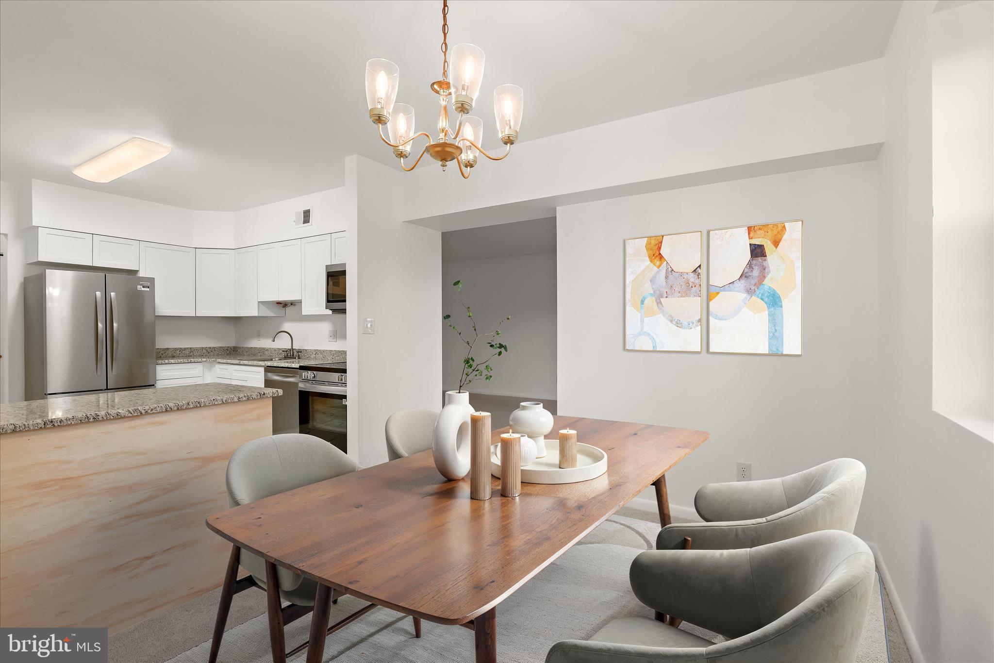 102 Castletown Road, Unit 201 Lutherville-Timonium, MD 21093 - Photo 4 of 33 Dining area & kitchen (virtually staged)
