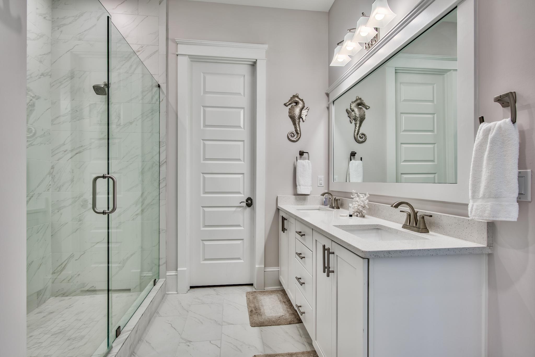 75 Siasconset Ln Inlet Beach Inlet Beach, FL 32461 - Photo 14 of 64 a spacious bathroom with a double vanity sink a mirror and shower