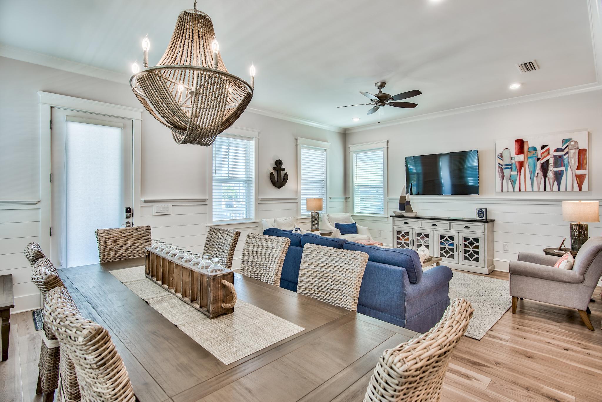 75 Siasconset Ln Inlet Beach Inlet Beach, FL 32461 - Photo 3 of 64 a living room with furniture a rug and a chandelier