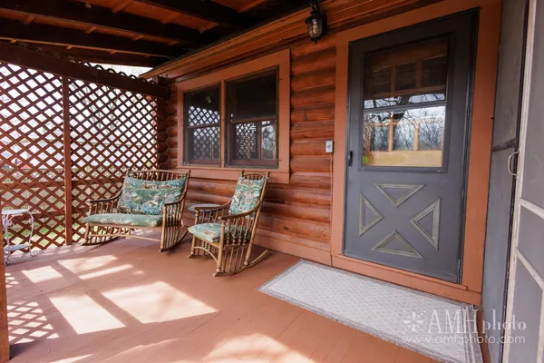 a view of a chairs and tables in the patio