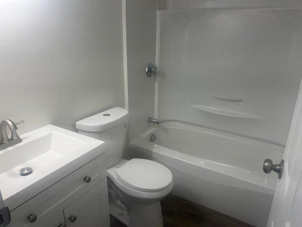 800 County Street, Unit 20 Taunton, MA 02780 - Photo 11 of 19 a bathroom with a sink a toilet and shower