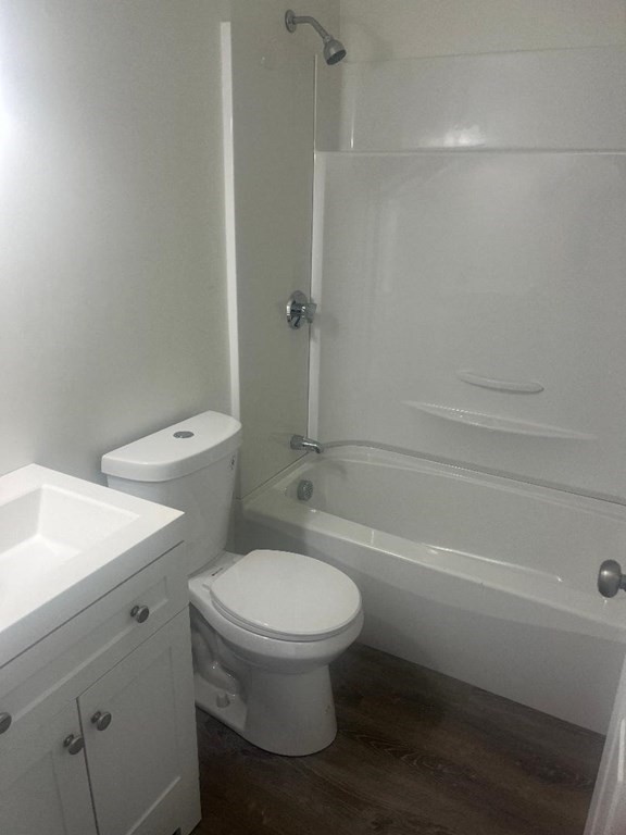 800 County Street, Unit 20 Taunton, MA 02780 - Photo 10 of 19 a white toilet sitting next to a bath tub