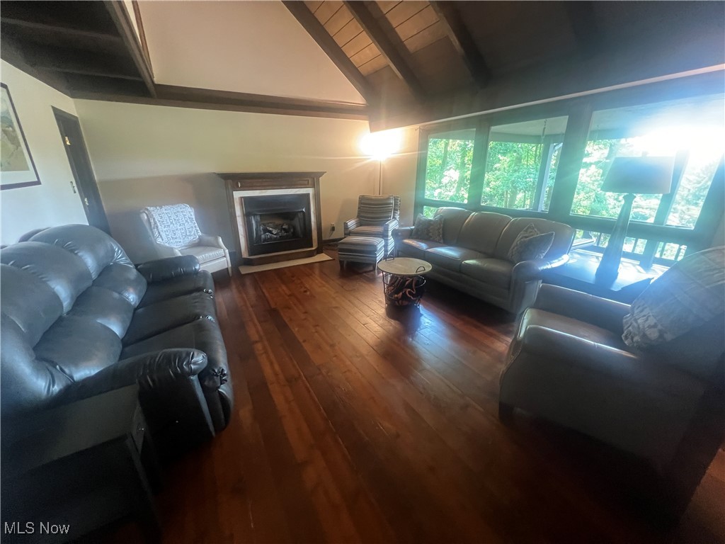86301 North Bay Road Scio, OH 43988 - Photo 9 of 50 Living room featuring lofted ceiling and wood-type flooring