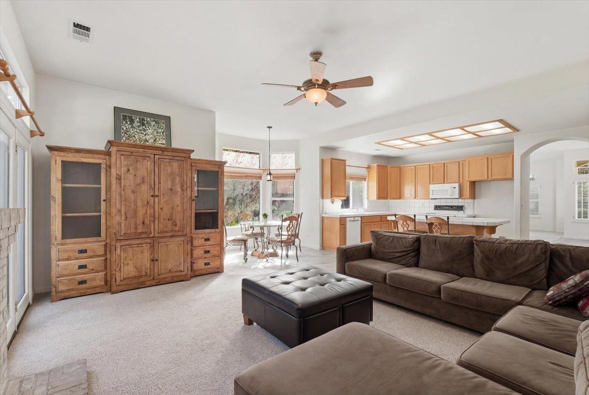 1903 Alex Way Turlock, CA 95382 - Photo 17 of 40 a living room with furniture and a kitchen