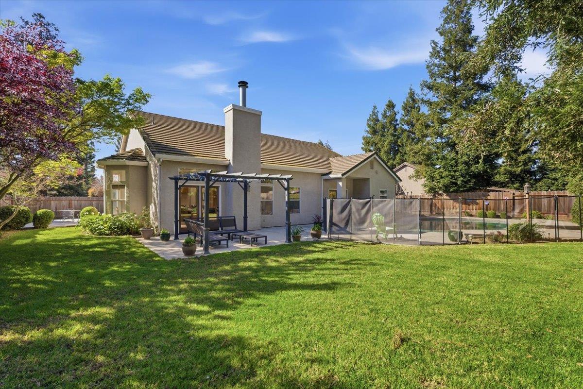 1903 Alex Way Turlock, CA 95382 - Photo 28 of 40 a view of a house with a yard porch and sitting area