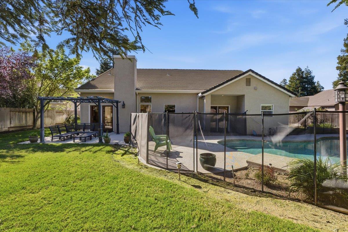 1903 Alex Way Turlock, CA 95382 - Photo 29 of 40 a view of a house with backyard porch and sitting area