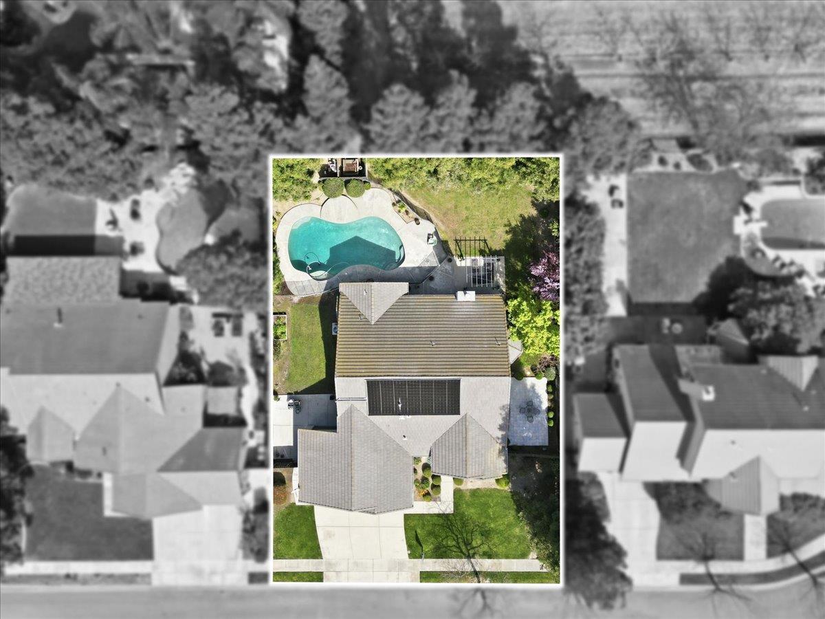 1903 Alex Way Turlock, CA 95382 - Photo 39 of 40 an aerial view of houses with a yard