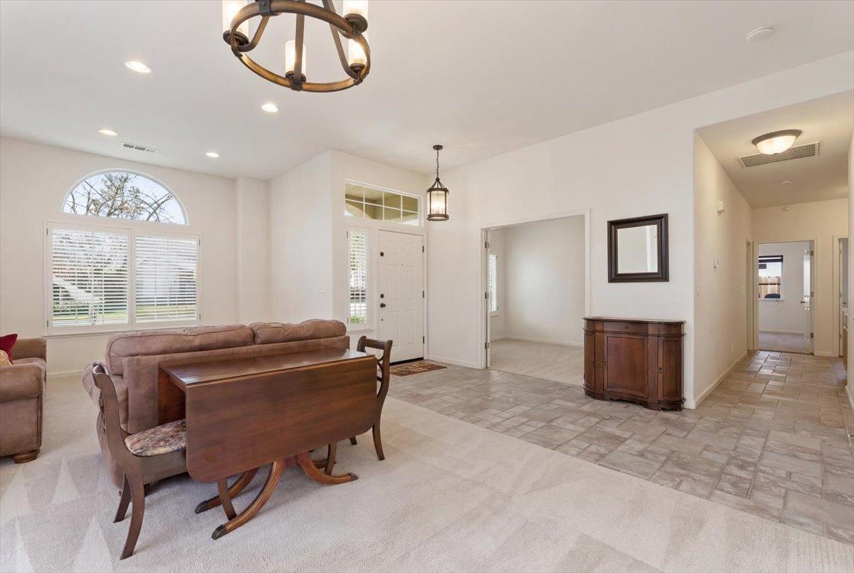 1903 Alex Way Turlock, CA 95382 - Photo 4 of 40 a living room with furniture and a large window
