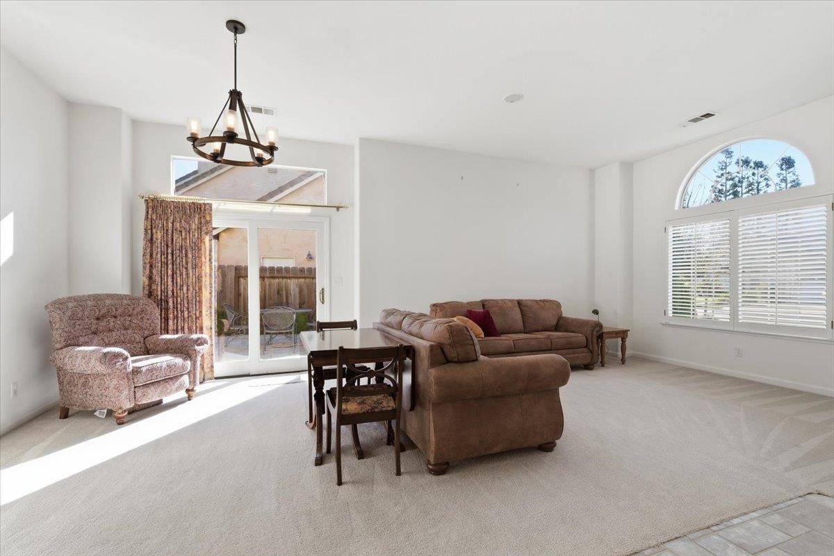 1903 Alex Way Turlock, CA 95382 - Photo 5 of 40 a living room with furniture and a window