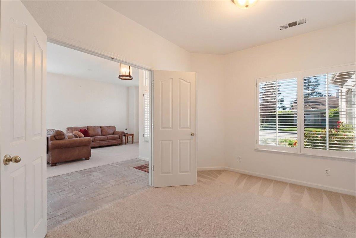 1903 Alex Way Turlock, CA 95382 - Photo 9 of 40 a living room with furniture and a window
