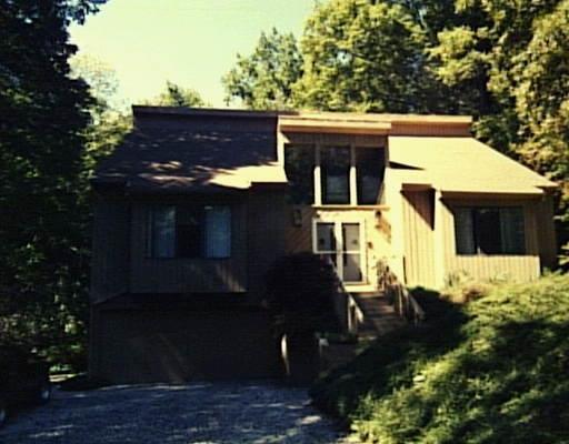12 Arapaho Road Brookfield, CT 06804 - Photo 1 of 1 a front view of a house with a yard