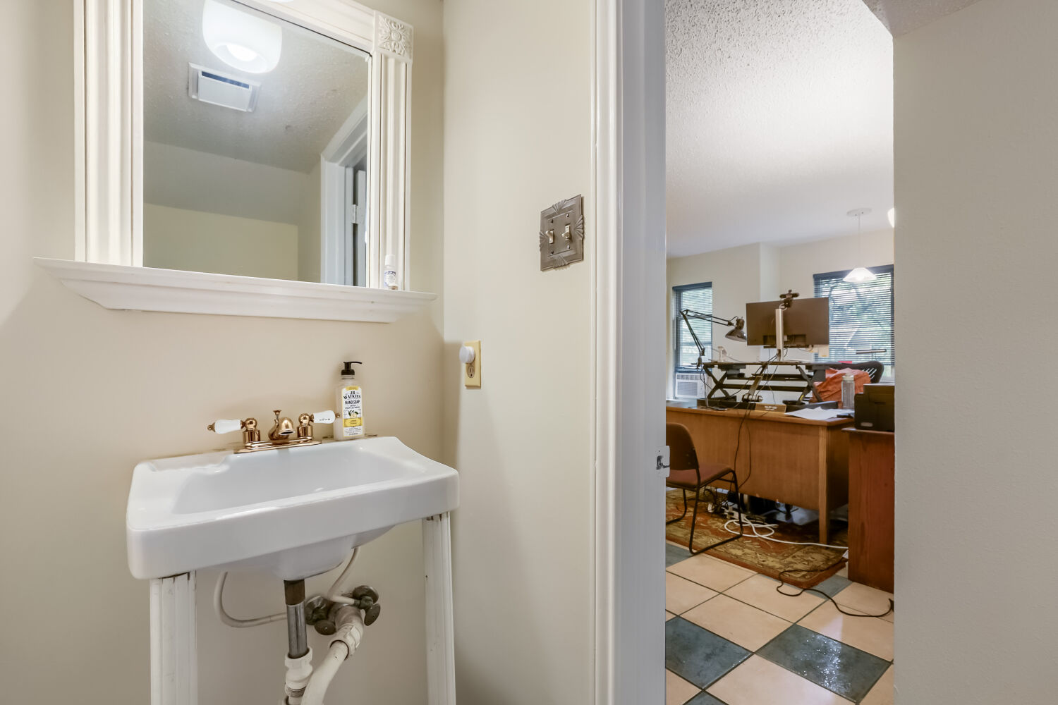 13129 New Boston Bend Austin, TX 78729 - Photo 20 of 26 Bathroom featuring a textured ceiling and light tile patterned flooring