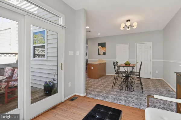 a living room with furniture or couch and a flat screen tv
