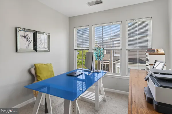 a kitchen with stainless steel appliances granite countertop a stove a sink dishwasher and a microwave