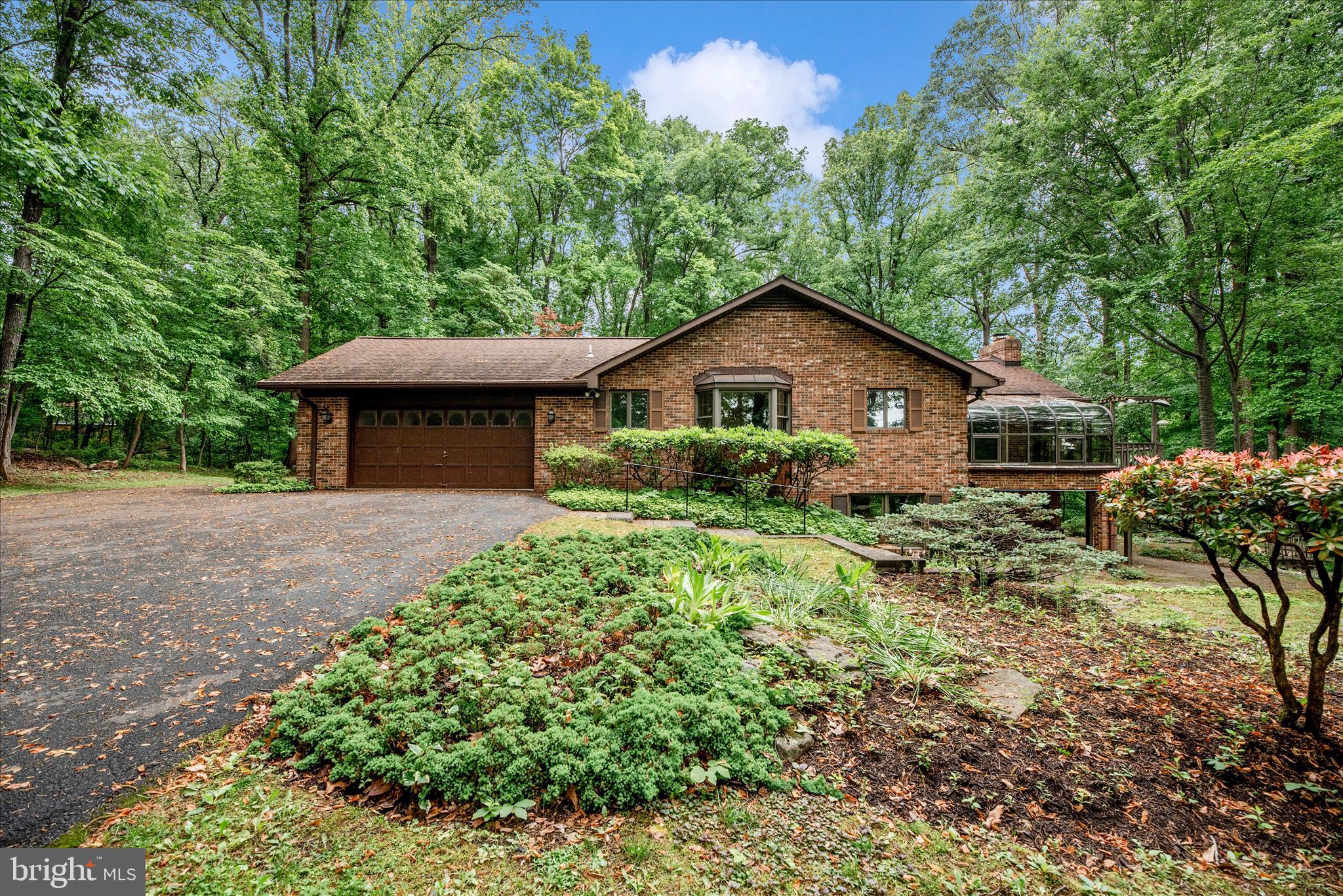 2221 Gold Mine Road Brookeville, MD 20833 - Photo 1 of 60 a view of a house with a yard and potted plants