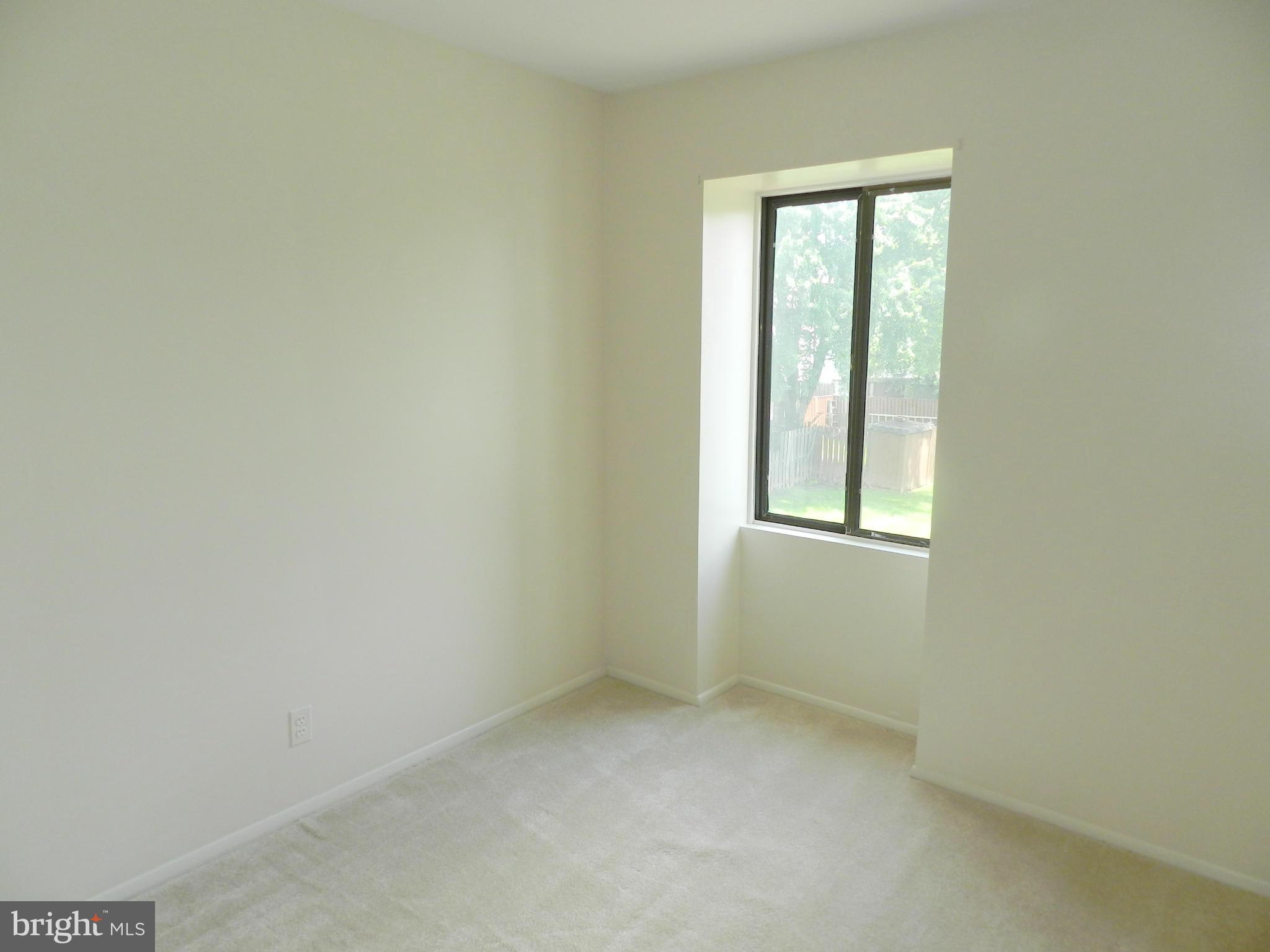 17435 Hughes Road Poolesville, MD 20837 - Photo 16 of 23 a view of an empty room with a window