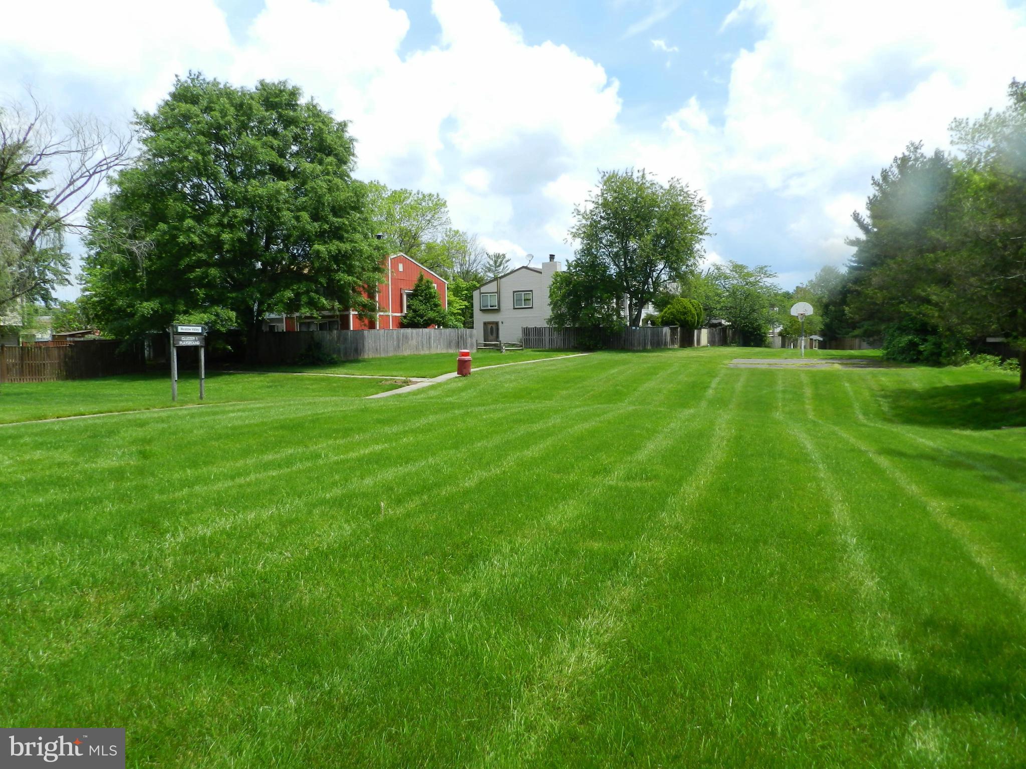 17435 Hughes Road Poolesville, MD 20837 - Photo 18 of 23 a view of an house with a big yard and large trees