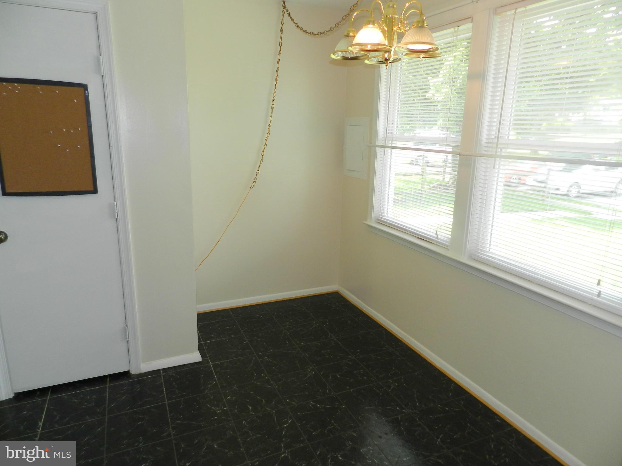 17435 Hughes Road Poolesville, MD 20837 - Photo 5 of 23 a view of an empty room with a window