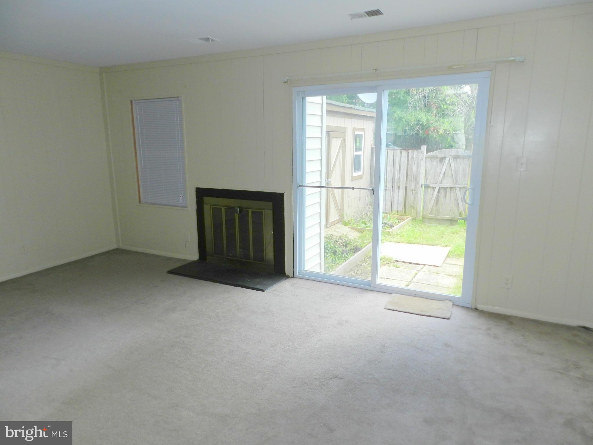 17435 Hughes Road Poolesville, MD 20837 - Photo 6 of 23 an empty room with windows