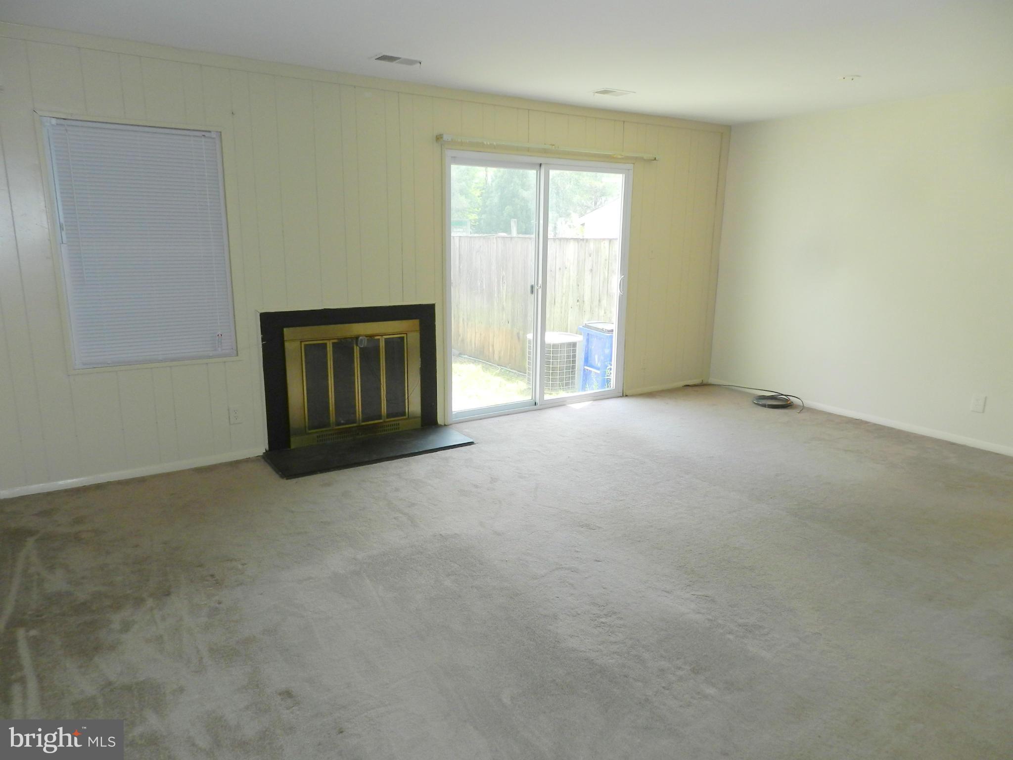 17435 Hughes Road Poolesville, MD 20837 - Photo 8 of 23 a view of an empty room with a window