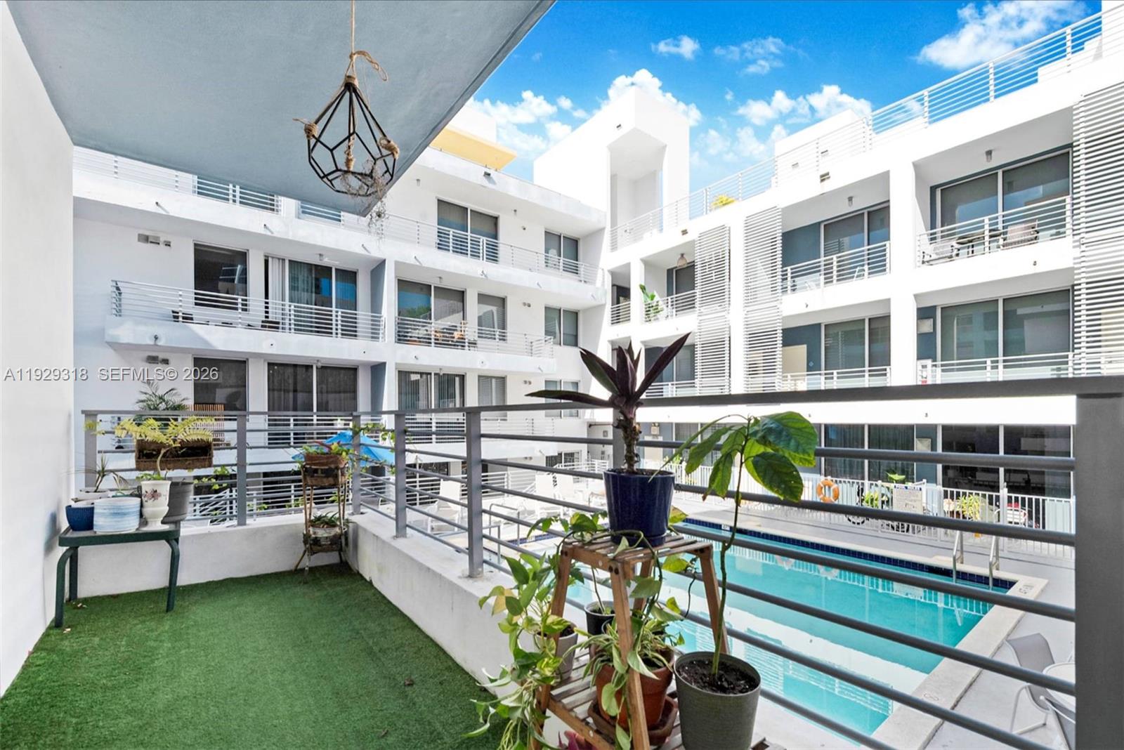 3339 Virginia Street, Unit 305 Miami, FL 33133 - Photo 15 of 17 a view of a building with a porch