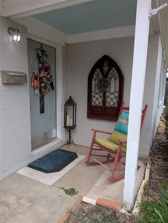 a view of entryway with furniture and rug