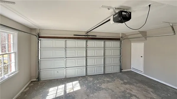 a view of empty room with windows