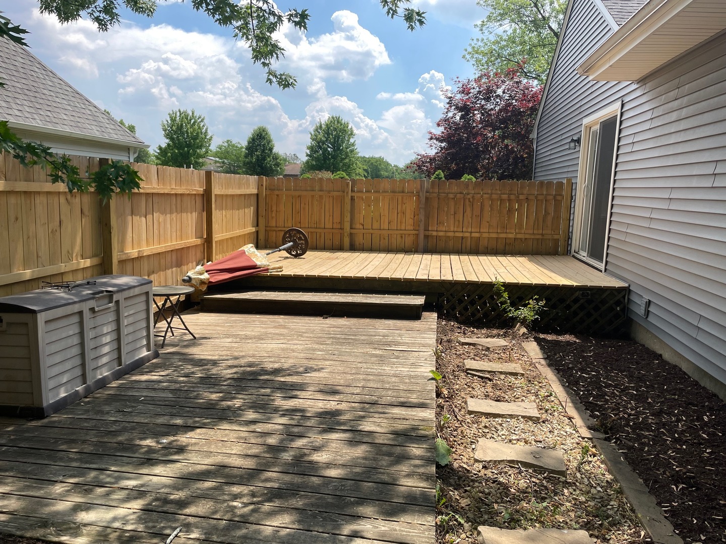 62 Fernwood Road Montgomery, IL 60538 - Photo 16 of 16 a view of a back yard with a chair
